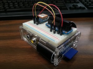 Completed Raspberry Pi with GPS, breadboard and case assembled.
